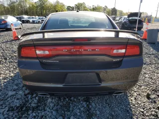 2014 Dodge Charger SXT with VIN 2C3CDXHG7EH238396, listed as a Copart auction lot 52181305 with 129,599 mi miles and Salvage Title. Bid and sale history available at carsss.com. Image 6.