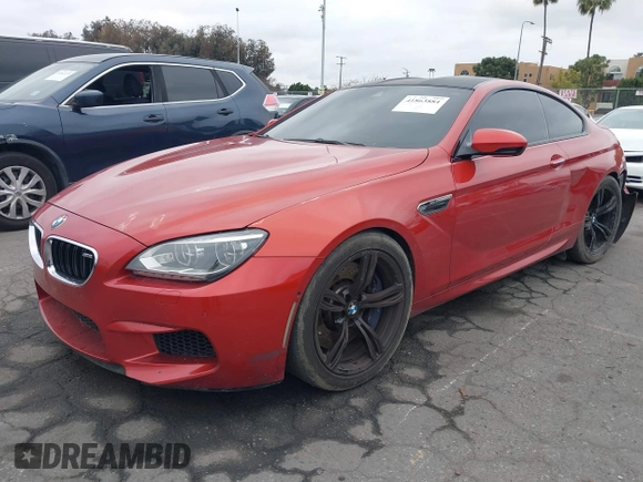 2013 BMW M6 z VIN WBSLX9C55DC968497, wystawiony jako IAAI lot #41863884 z przebiegiem 128 241 mil mil oraz . Historia ofert i sprzedaży dostępna na DreamBid. Obrazek 2.