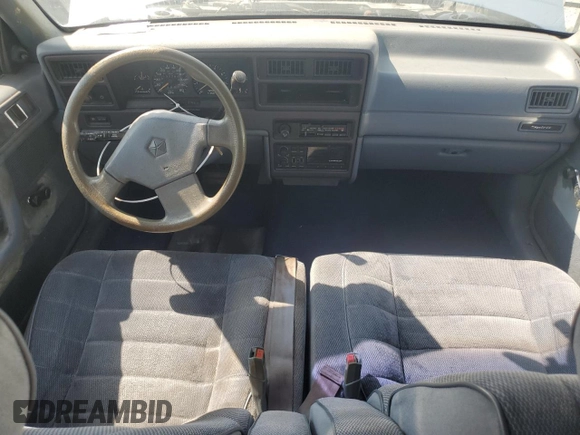 1989 Dodge Spirit z VIN 1B3BA46K1KF408949, wystawiony jako Copart lot #80767594 z przebiegiem 137 766 mil mil oraz Nie do naprawy. Historia ofert i sprzedaży dostępna na DreamBid. Obrazek 8.