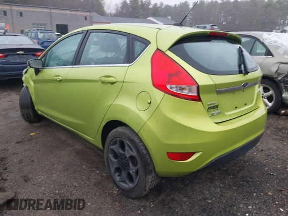 2011 Ford Fiesta SES with VIN 3FADP4FJ8BM107209, listed as a IAAI auction lot 41838522 with 142,730 mi miles. Bid and sale history available at carsss.com. Image 3.