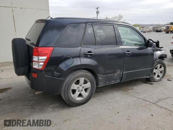 2009 Suzuki Grand Vitara with VIN JS3TE044094100649, listed as a Copart auction lot 52033855 with 137,460 mi miles and Salvage title. Bid and sale history available at DreamBid. Image 3.