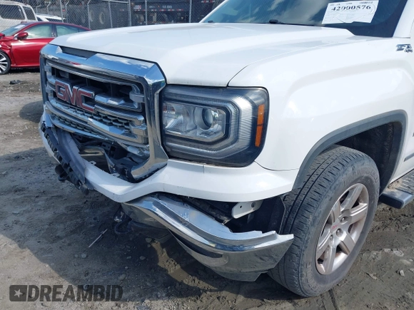 2017 GMC Sierra 1500 SLT z VIN 3GTU2NEC9HG192084, wystawiony jako IAAI lot #42000576 z przebiegiem 91 403 mil mil oraz . Historia ofert i sprzedaży dostępna na DreamBid. Obrazek 6.