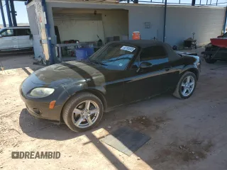 2006 Mazda MX-5 Miata Touring with VIN JM1NC25F760106900, listed as a Copart auction lot 62765505 with 148,037 mi miles and Salvage title. Bid and sale history available at DreamBid. Image 1.