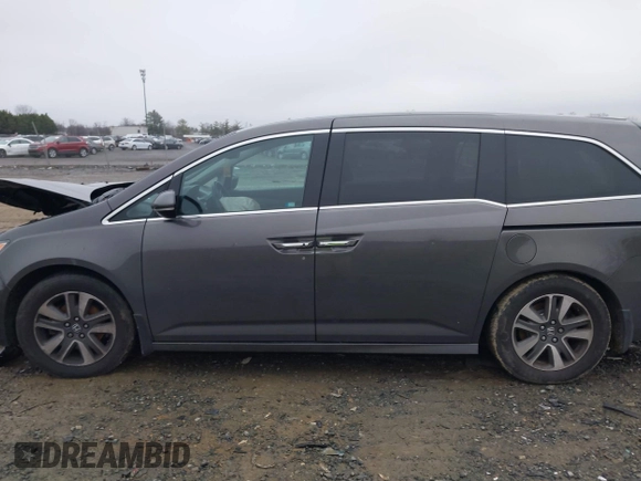 2015 Honda Odyssey Touring Elite with VIN 5FNRL5H92FB089627, listed as a IAAI auction lot 41115013 with Not Provided miles and . Bid and sale history available at DreamBid. Image 14.