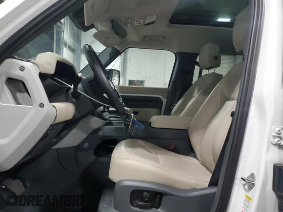 2023 Land Rover Defender SE with VIN SALEP7EU4P2166759, listed as a Copart auction lot 84407784 with 30,992 mi miles and Salvage title. Bid and sale history available at DreamBid. Image 7.