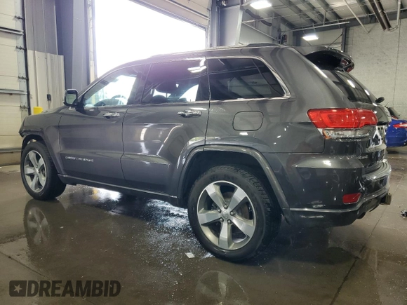 2016 Jeep Grand Cherokee Overland with VIN 1C4RJFCG9GC345309, listed as a Copart auction lot 61095285 with 115,968 mi miles and Salvage title. Bid and sale history available at DreamBid. Image 2.