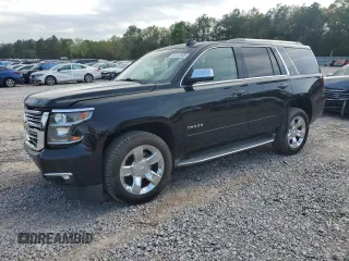 2016 Chevrolet Tahoe LTZ z VIN 1GNSCCKC0GR239540, wystawiony jako Copart lot #50720995 z przebiegiem 129 185 mil mil oraz Szkoda całkowita • Salvage title. Historia ofert i sprzedaży dostępna na DreamBid. Obrazek 1.