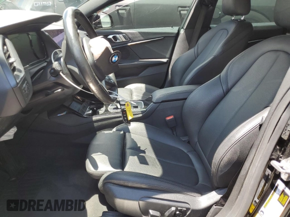 2021 BMW 2 Series 228i xDrive with VIN WBA73AK01M7H54370, listed as a Copart auction lot 61303235 with 72,804 mi miles and Salvage title. Bid and sale history available at DreamBid. Image 7.
