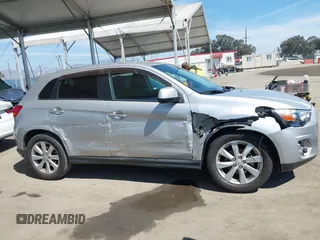 2014 Mitsubishi Outlander Sport ES with VIN 4A4AP3AUXEE003879, listed as a IAAI auction lot 41862379 with 65,297 mi miles. Bid and sale history available at carsss.com. Image 13.