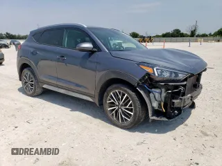 2021 Hyundai Tucson SEL with VIN KM8J33AL0MU296945, listed as a Copart auction lot 57137515 with 54,657 mi miles and Salvage title. Bid and sale history available at DreamBid. Image 4.