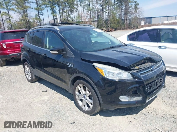 2016 Ford Escape Titanium with VIN 1FMCU0JX8GUC06601, listed as a IAAI auction lot 41785774 with 121,427 mi miles. Bid and sale history available at carsss.com. Image 1.