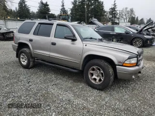 2000 Dodge Durango with VIN 1B4HS28Z6YF121861, listed as a Copart auction lot 87669175 with 115,990 mi miles and Salvage Title. Bid and sale history available at DreamBid. Image 4.