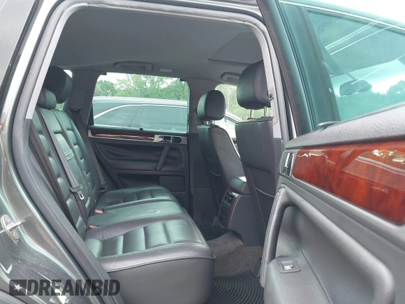 2004 Volkswagen Touareg with VIN WVGCM77L14D045663, listed as a IAAI auction lot 42170895 with 96,709 mi miles and . Bid and sale history available at DreamBid. Image 8.