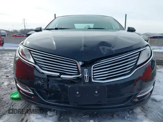 2016 Lincoln MKZ z VIN 3LN6L2JK8GR602793, wystawiony jako IAAI lot #41744058 z przebiegiem 105 234 mil mil oraz . Historia ofert i sprzedaży dostępna na DreamBid. Obrazek 12.