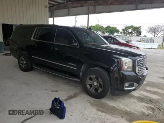 2020 GMC Yukon XL Denali with VIN 1GKS1HKJ6LR127236, listed as a Copart auction lot 76639424 with 143,579 mi miles and Salvage Title. Bid and sale history available at carsss.com. Image 4.