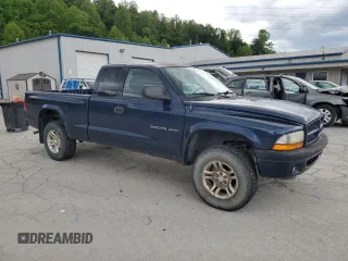 2002 Dodge Dakota z VIN 1B7GG32X32S546515, wystawiony jako Copart lot #57888695 z przebiegiem 81 202 mil mil oraz Szkoda całkowita • Salvage title. Historia ofert i sprzedaży dostępna na DreamBid. Obrazek 4.