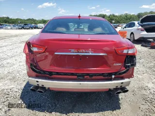 2014 Maserati Ghibli z VIN ZAM57XSA7E1126742, wystawiony jako Copart lot #57495135 z przebiegiem 50 077 mil mil oraz Szkoda całkowita • Salvage title. Historia ofert i sprzedaży dostępna na DreamBid. Obrazek 6.