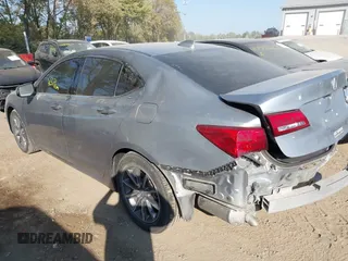 2019 Acura TLX with VIN 19UUB1F3XKA009385, listed as a IAAI auction lot 40584274 with 61,376 mi miles. Bid and sale history available at carsss.com. Image 3.
