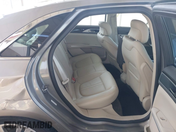 2016 Lincoln MKZ z VIN 3LN6L2J90GR614644, wystawiony jako IAAI lot #42547420 z przebiegiem 45 237 mil mil oraz . Historia ofert i sprzedaży dostępna na DreamBid. Obrazek 8.