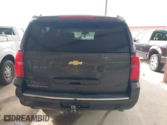 2015 Chevrolet Suburban LTZ with VIN 1GNSCKKC7FR272138, listed as a IAAI auction lot 42047823 with 198,314 mi miles and . Bid and sale history available at DreamBid. Image 16.