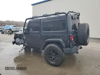 2017 Jeep Wrangler Sport z VIN 1C4AJWAG4HL563093, wystawiony jako Copart lot #51603125 z przebiegiem 105 618 mil mil oraz Szkoda całkowita • Salvage title. Historia ofert i sprzedaży dostępna na DreamBid. Obrazek 2.
