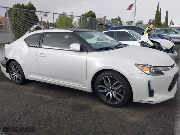 2016 Scion tC with VIN JTKJF5C75GJ014448, listed as a IAAI auction lot 41755541 with 60,571 mi miles. Bid and sale history available at carsss.com. Image 13.