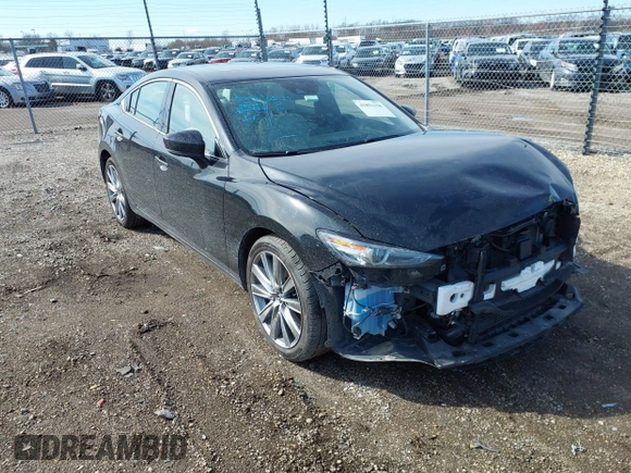 2021 Mazda 6 Signature with VIN JM1GL1XY7M1615149, listed as a IAAI auction lot 41851158 with 47,690 mi miles and . Bid and sale history available at DreamBid. Image 1.