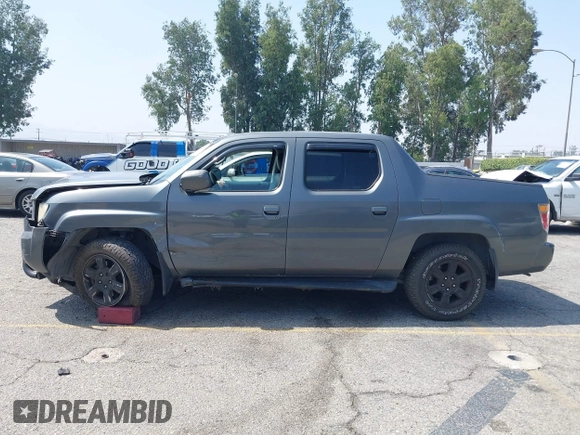 2007 Honda Ridgeline RTL with VIN 2HJYK16547H502601, listed as a IAAI auction lot 42484634 with 197,253 mi miles and . Bid and sale history available at DreamBid. Image 14.