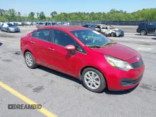 2014 Kia Rio LX with VIN KNADM4A39E6364540, listed as a IAAI auction lot 42024972 with 115,821 mi miles. Bid and sale history available at carsss.com. Image 1.