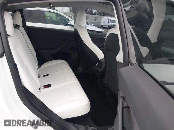 2023 Tesla Model Y Long Range with VIN 7SAYGDEE1PA106057, listed as a IAAI auction lot 41778642 with 1 mi miles. Bid and sale history available at carsss.com. Image 8.