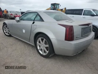 2008 Cadillac XLR z VIN 1G6YV36A285600199, wystawiony jako Copart lot #76229514 z przebiegiem Nie podano mil oraz Szkody całkowita. Historia ofert i sprzedaży dostępna na DreamBid. Obrazek 2.