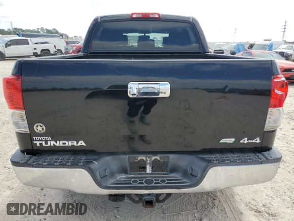 2012 Toyota Tundra 4WD Truck with VIN 5TFDW5F16CX247953, listed as a Copart auction lot 52457445 with 215,411 mi miles and Salvage Title. Bid and sale history available at carsss.com. Image 6.