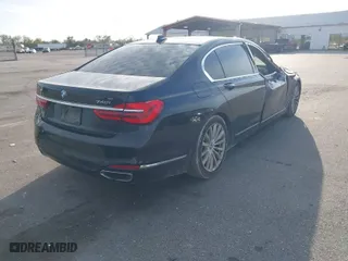2016 BMW 7 Series 740i with VIN WBA7E2C55GG504089, listed as a IAAI auction lot 41096291 with 138732 miles. Bid and sale history available at carsss.com. Image 4.