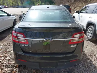 2014 Ford Taurus SHO with VIN 1FAHP2KT8EG131067, listed as a IAAI auction lot 42102086 with 107,822 mi miles. Bid and sale history available at carsss.com. Image 16.