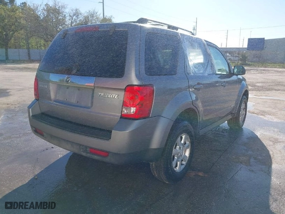 2008 Mazda Tribute Grand Touring with VIN 4F2CZ02Z78KM12026, listed as a IAAI auction lot 41671615 with 204,422 mi miles. Bid and sale history available at carsss.com. Image 4.