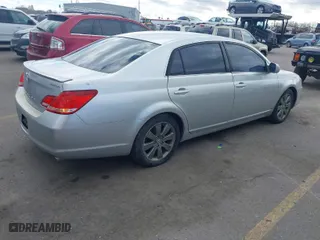 2007 Toyota Avalon XL with VIN 4T1BK36BX7U249496, listed as a IAAI auction lot 41670507 with 213,381 mi miles. Bid and sale history available at carsss.com. Image 4.