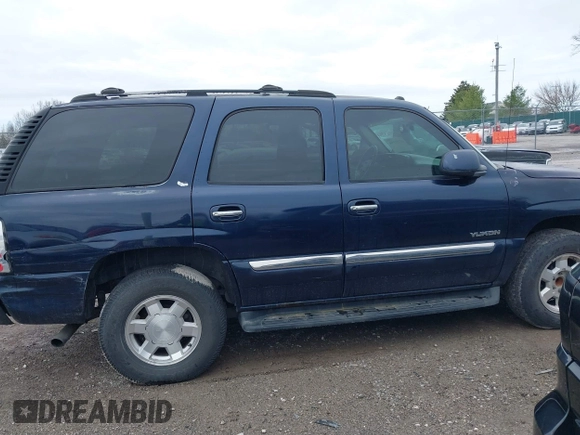 2005 GMC Yukon SLT with VIN 1GKEC13T45J139885, listed as a IAAI auction lot 41796394 with 229,494 mi miles. Bid and sale history available at carsss.com. Image 13.