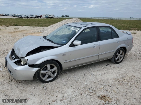 2003 Mazda Protege DX with VIN JM1BJ226631162054, listed as a Copart auction lot 70961034 with 85,794 mi miles and Salvage Title. Bid and sale history available at carsss.com. Image 1.