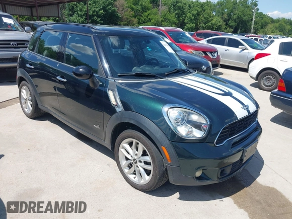 2011 MINI Countryman S with VIN WMWZC5C53BWM10484, listed as a IAAI auction lot 42250690 with 113,534 mi miles and . Bid and sale history available at DreamBid. Image 1.