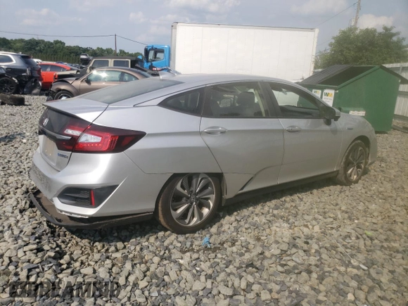 2018 Honda Clarity with VIN JHMZC5F14JC017054, listed as a Copart auction lot 65295514 with 74,498 mi miles and Salvage title. Bid and sale history available at DreamBid. Image 3.