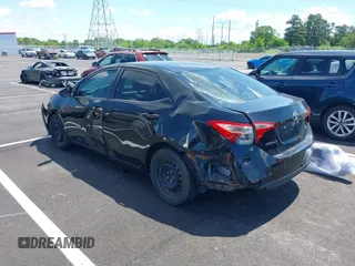 2019 Toyota Corolla L with VIN 5YFBURHE4KP860848, listed as a IAAI auction lot 42167529 with 152,301 mi miles. Bid and sale history available at carsss.com. Image 3.