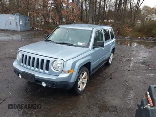2013 Jeep Patriot Latitude with VIN 1C4NJPFB7DD251536, listed as a IAAI auction lot 41985457 with 165,875 mi miles. Bid and sale history available at carsss.com. Image 2.
