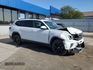 2022 Volkswagen Atlas SE with VIN 1V2KR2CA5NC547106, listed as a Copart auction lot 57410145 with 69,622 mi miles and Salvage title. Bid and sale history available at DreamBid. Image 4.
