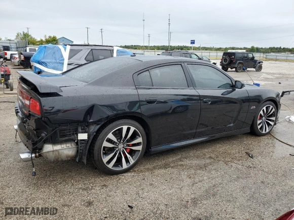 2012 Dodge Charger SRT8 with VIN 2C3CDXEJ8CH217246, listed as a Copart auction lot 71079334 with 105,528 mi miles and Salvage Title. Bid and sale history available at carsss.com. Image 3.