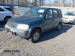 2001 Honda CR-V LX with VIN JHLRD18431C016561, listed as a IAAI auction lot 41770542 with 135,447 mi miles. Bid and sale history available at carsss.com. Image 2.