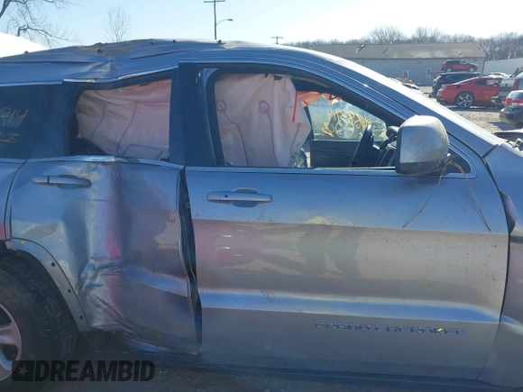 2014 Jeep Grand Cherokee Laredo with VIN 1C4RJFAG0EC289647, listed as a IAAI auction lot 41883914 with 176,501 mi miles and . Bid and sale history available at DreamBid. Image 13.