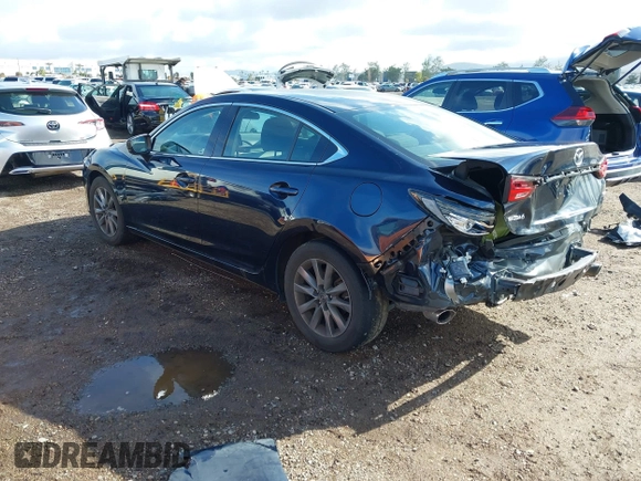 2020 Mazda 6 Sport with VIN JM1GL1UM5L1519519, listed as a IAAI auction lot 41920571 with 59,378 mi miles and . Bid and sale history available at DreamBid. Image 3.