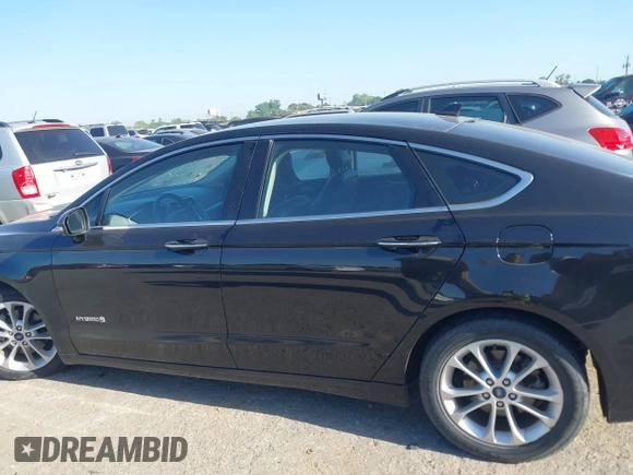 2019 Ford Fusion SEL with VIN 3FA6P0MU5KR203851, listed as a IAAI auction lot 41982637 with 96,954 mi miles and . Bid and sale history available at DreamBid. Image 14.