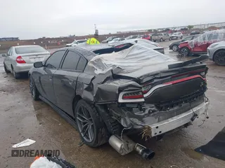 2020 Dodge Charger Scat Pack z VIN 2C3CDXGJXLH107344, wystawiony jako IAAI lot #41888453 z przebiegiem Nie podano mil oraz . Historia ofert i sprzedaży dostępna na DreamBid. Obrazek 3.
