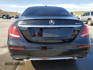 2018 Mercedes-Benz E 300 with VIN WDDZF4KBXJA464197, listed as a Copart auction lot 53205215 with 38,002 mi miles and Salvage title. Bid and sale history available at DreamBid. Image 6.